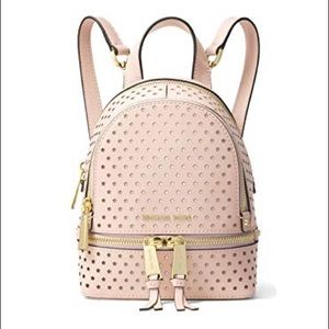 Michael Kors Rhea Mini perforated pink backpack